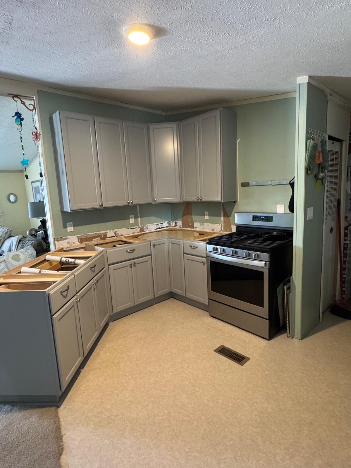 Kitchen range and cabinet installation