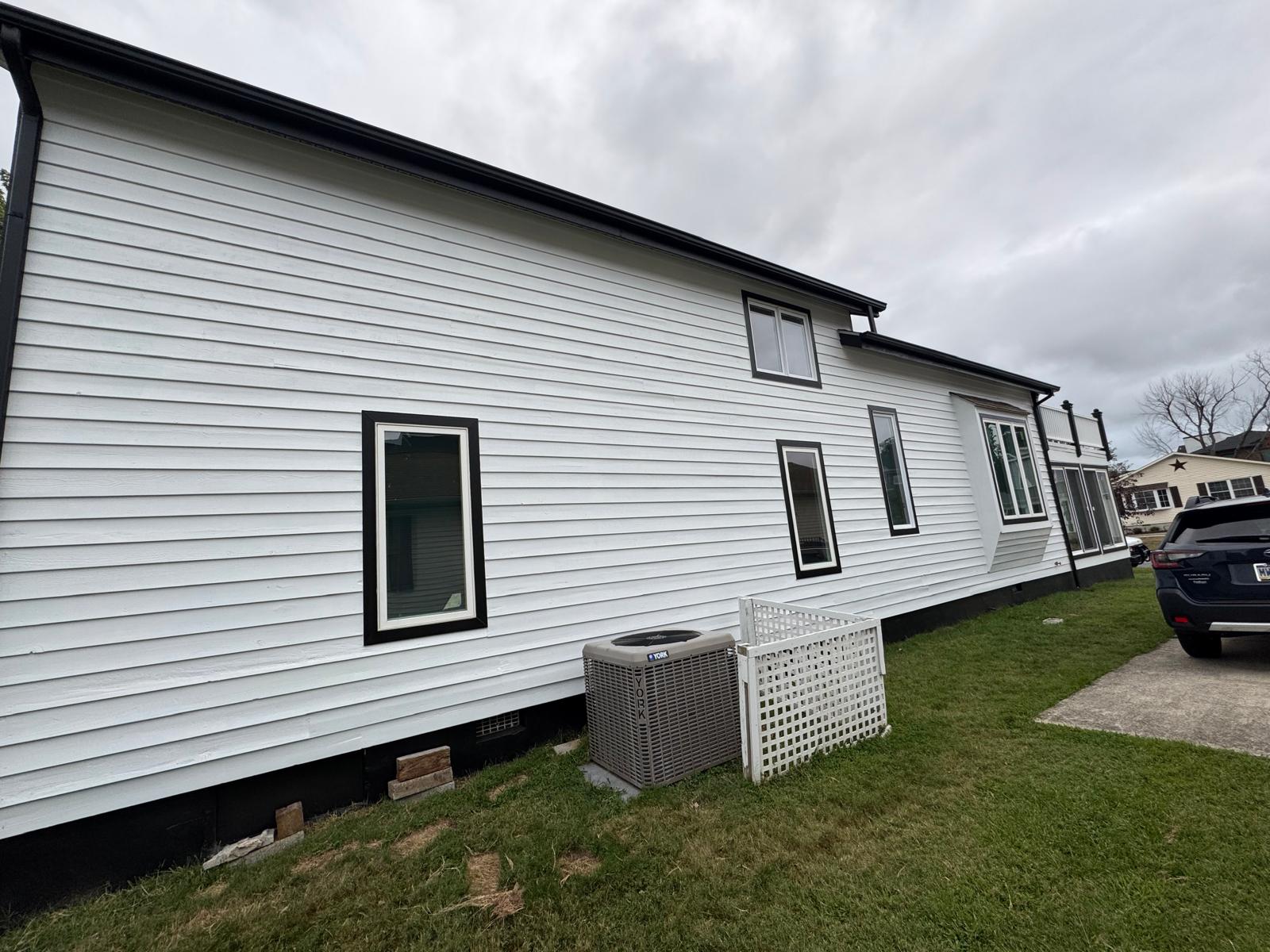 White siding black trim
