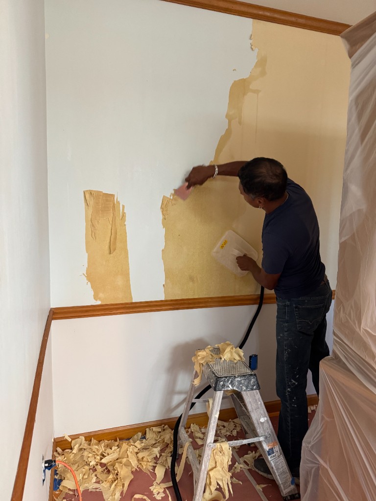 Wallpaper removal in progress